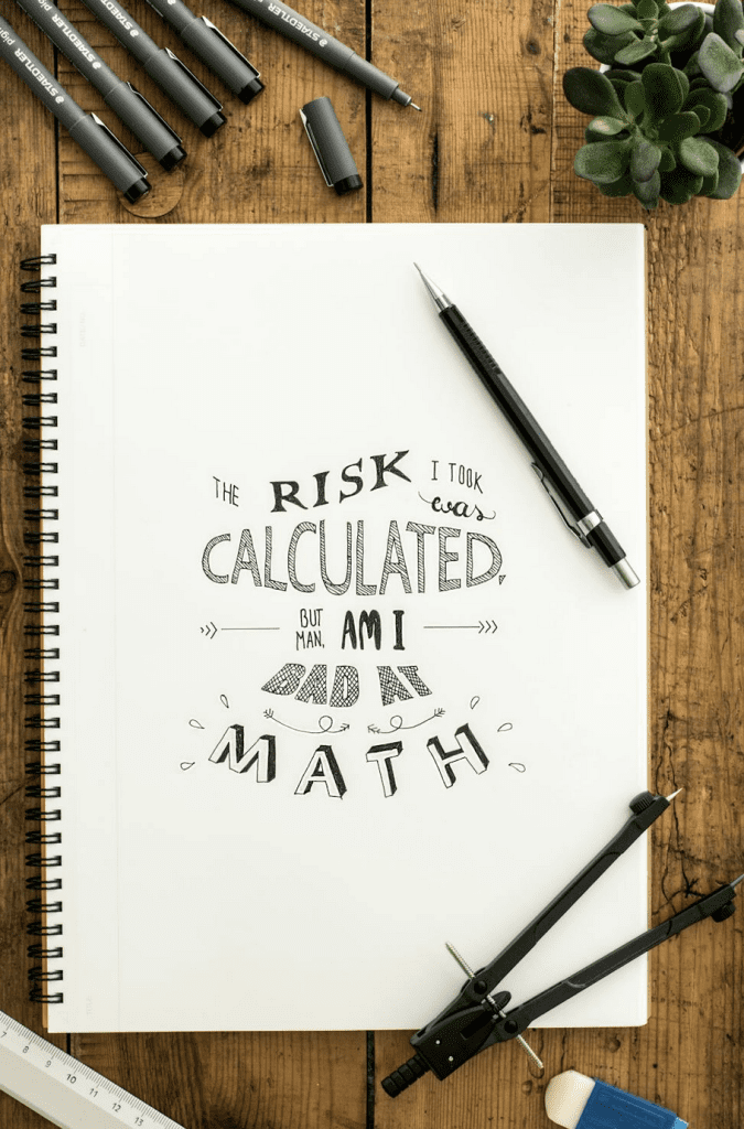 A notebook that says "The risk I took was calculated, but boy am I bad at math."